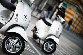 a picture of scooters or mopeds used on an accident service page for heintz & becker
