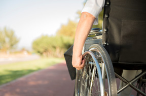 poicture of a person using a wheelchair for the spinal cord injury page for a florida law firm
